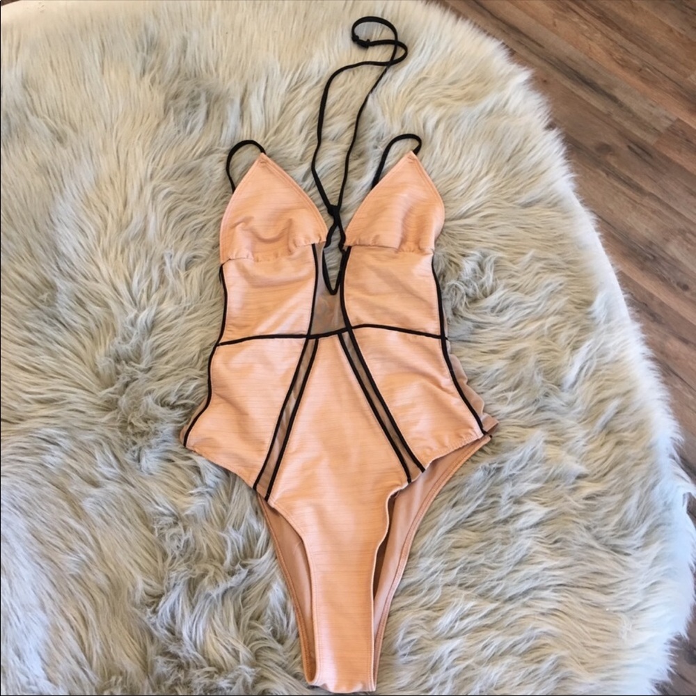 For love and lemons one piece swim suit.